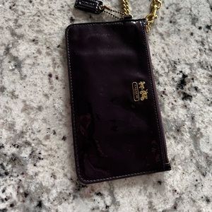 Coach purple patten leather wristlet